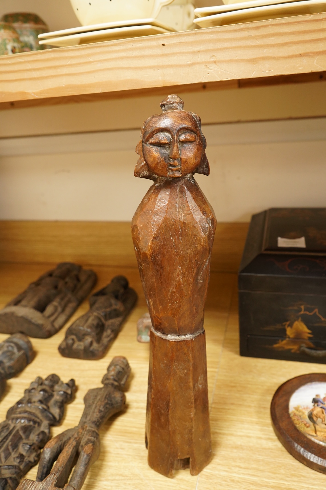 A group of Indian carved figures of deities, largest 42.5cm